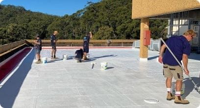 People Waterproofing the Outdoor Patio — Internal Waterproofing in Central Coast, NSW